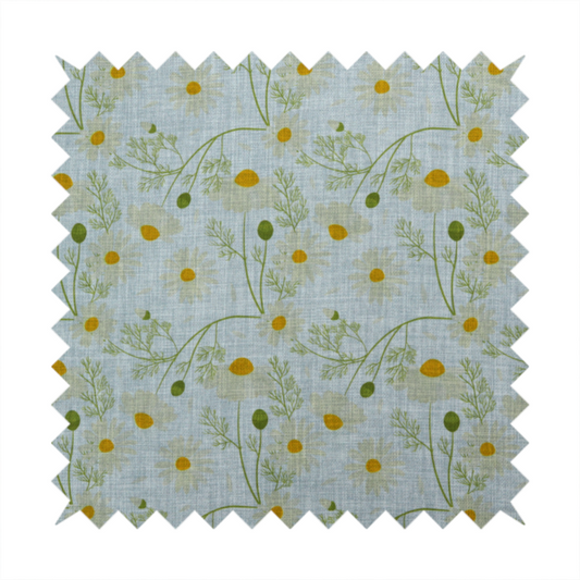 Light blue fabric with a repeating botanical chamomile flower and green foliage pattern