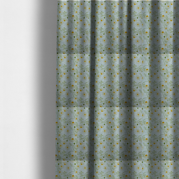 The fabric used to create these made-to-measure curtains is a light blue fabric with a repeating botanical chamomile flower and green foliage pattern