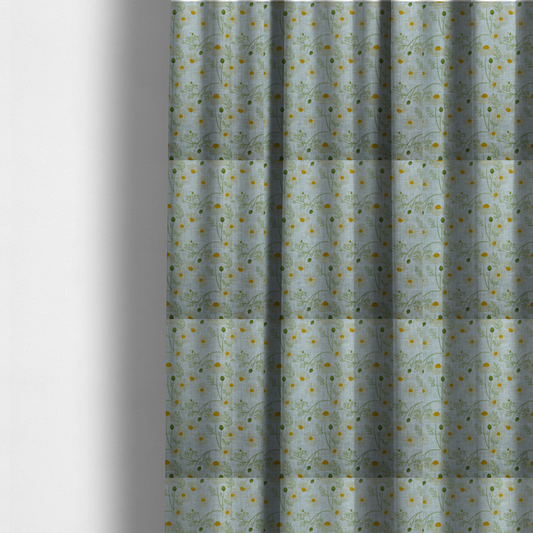 The fabric used to create these made-to-measure curtains is a light blue fabric with a repeating botanical chamomile flower and green foliage pattern
