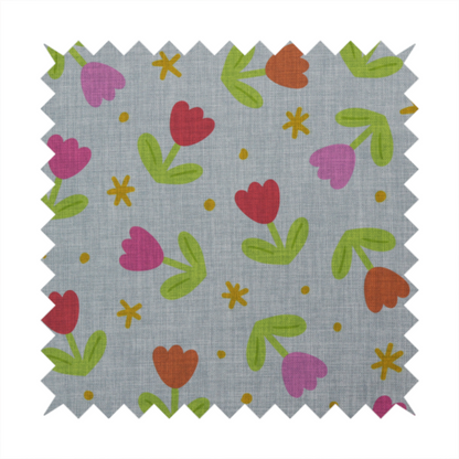 Muted greyish-blue fabric with a whimsical pattern of colourful tulips and small gold accents.