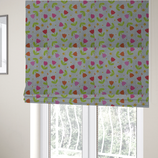 The fabric used to create these Roman blinds is a muted greyish-blue fabric with a whimsical pattern of colourful tulips and small gold accents.