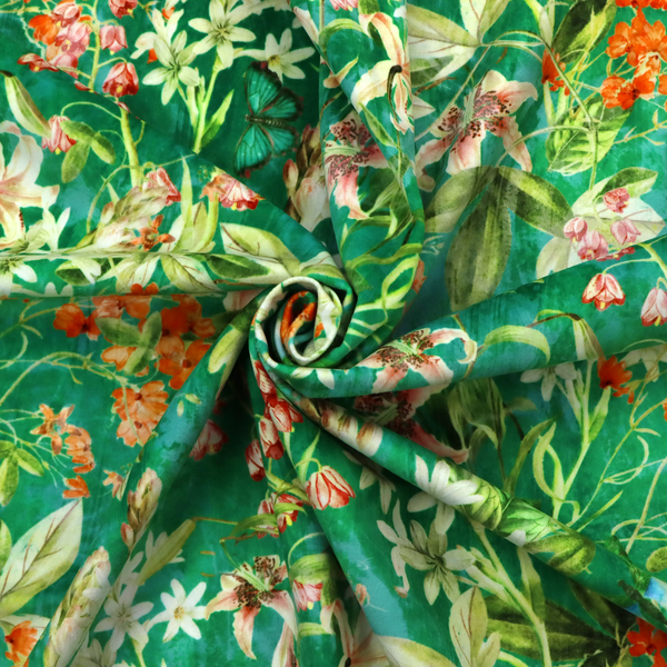 A dense, layered display of vibrant orange blossoms, delicate white jasmine-like star flowers, pink lily variations, and hanging bell-shaped blooms nestled among rich green foliage.