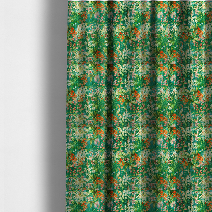 The fabric used to create these made-to-measure curtains is a dense, layered display of vibrant orange blossoms, delicate white jasmine-like star flowers, pink lily variations, and hanging bell-shaped blooms nestled among rich green foliage.