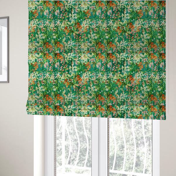 The fabric used to create these Roman blinds is a dense, layered display of vibrant orange blossoms, delicate white jasmine-like star flowers, pink lily variations, and hanging bell-shaped blooms nestled among rich green foliage.