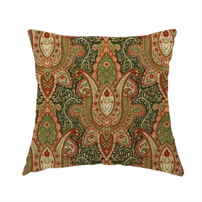The fabric used to create this handmade cushion is a repeating ornate paisley and damask medallion fabric pattern in terracotta, sage green, and cream on a forest green background.