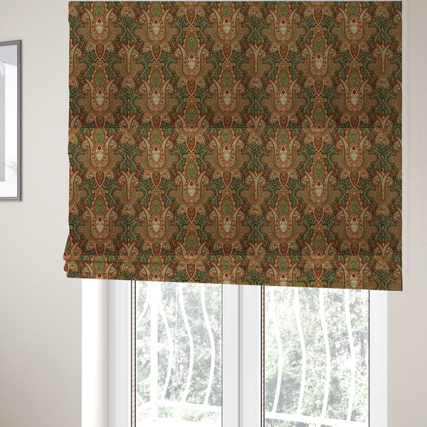 The fabric used to create these Roman blinds is a repeating ornate paisley and damask medallion fabric pattern in terracotta, sage green, and cream on a forest green background.