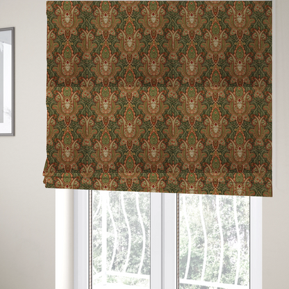 The fabric used to create these Roman blinds is a repeating ornate paisley and damask medallion fabric pattern in terracotta, sage green, and cream on a forest green background.
