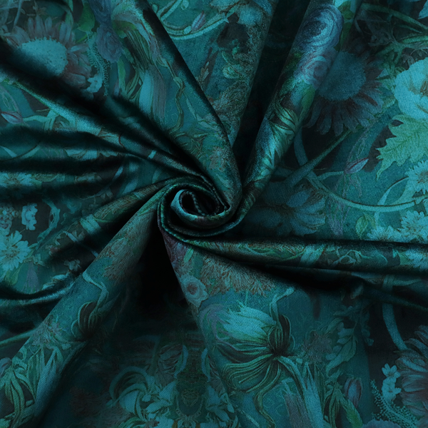 A symmetrical, damask-style botanical fabric pattern in deep teal and turquoise tones, featuring an intricate mirror-image design of large sunflowers, roses, swirling vines, and leafy foliage against a dark, textured background.