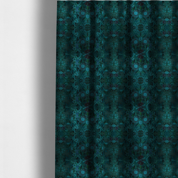The fabric used to create these made-to-measure curtains is a symmetrical, damask-style botanical fabric pattern in deep teal and turquoise tones, featuring an intricate mirror-image design of large sunflowers, roses, swirling vines, and leafy foliage against a dark, textured background.