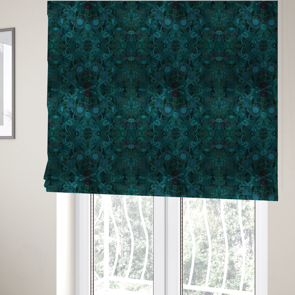 The fabric used to create these roman blinds is a symmetrical, damask-style botanical fabric pattern in deep teal and turquoise tones, featuring an intricate mirror-image design of large sunflowers, roses, swirling vines, and leafy foliage against a dark, textured background.
