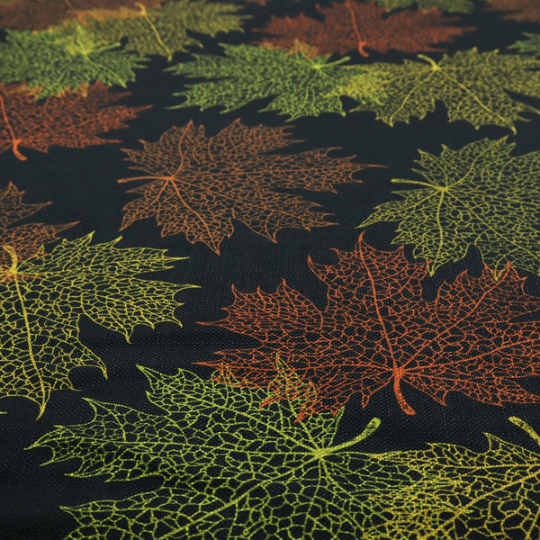 An autumn botanical fabric pattern featuring detailed skeleton maple leaf outlines in rust red, olive green, and gold on a black background.