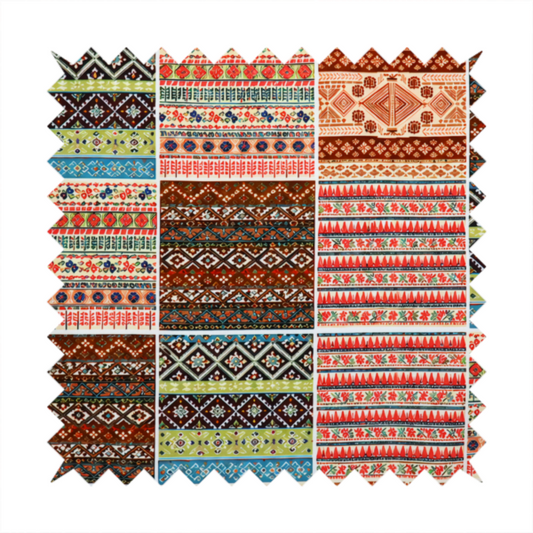 Vibrant multi-coloured tribal patchwork fabric featuring geometric and Aztec folk patterns.