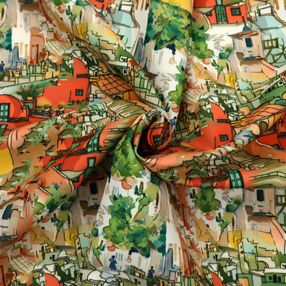 An illustrated fabric pattern featuring a Mediterranean hillside village with terracotta houses, green foliage, and ochre accents