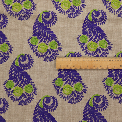 A repeating floral paisley pattern featuring vibrant indigo blue and lime green motifs set against a textured natural beige linen-effect background.