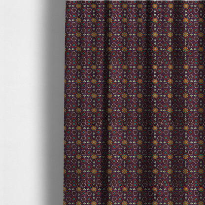 The fabric used to create these made-to-measure curtains is a geometric pattern fabric featuring a purple background with repeating orange and teal mandala-style floral motifs.