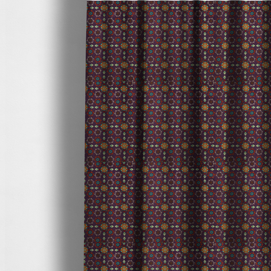 The fabric used to create these made-to-measure curtains is a geometric pattern fabric featuring a purple background with repeating orange and teal mandala-style floral motifs.