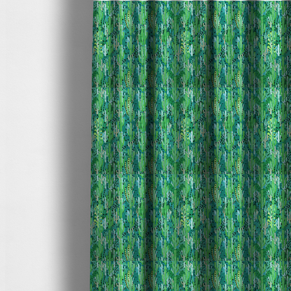 The fabric used to create these made-to-measure curtains is a vibrant, dense pattern of stylized painted saguaro cacti and succulents in shades of green, mint, and white with black polka dots and dashes over a turquoise background.