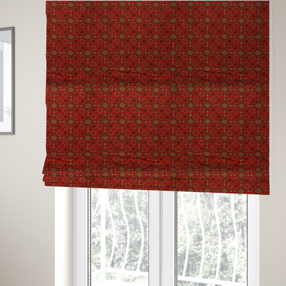 The fabric used to create these roman blinds is a traditional deep red block-print fabric featuring repeating geometric floral medallions.