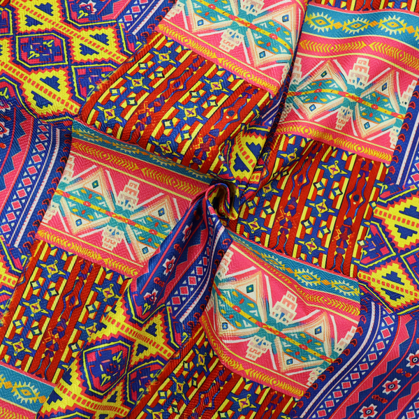 Seamless repeating geometric fabric pattern featuring vibrant tribal and Aztec-inspired patchwork bands in neon yellow, bright pink, cobalt blue, and turquoise.