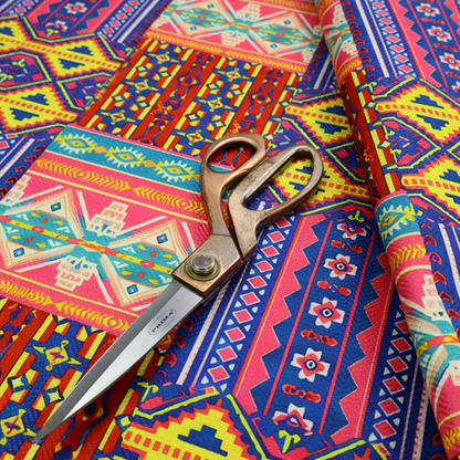 Seamless repeating geometric fabric pattern featuring vibrant tribal and Aztec-inspired patchwork bands in neon yellow, bright pink, cobalt blue, and turquoise.