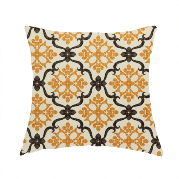 The fabric used to create this handmade cushion is a mustard yellow and dark brown vintage ogee damask pattern fabric on an off-white background.