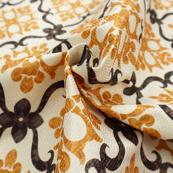 Mustard yellow and dark brown vintage ogee damask pattern fabric on an off-white background.