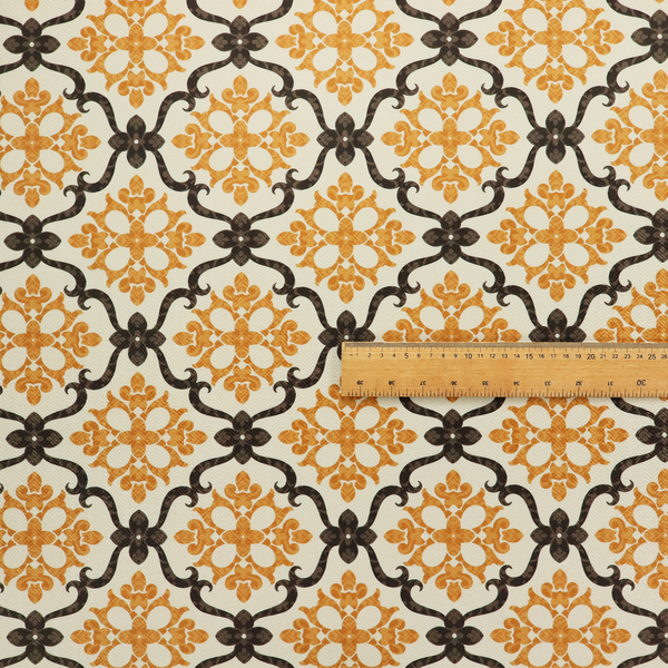 Mustard yellow and dark brown vintage ogee damask pattern fabric on an off-white background.