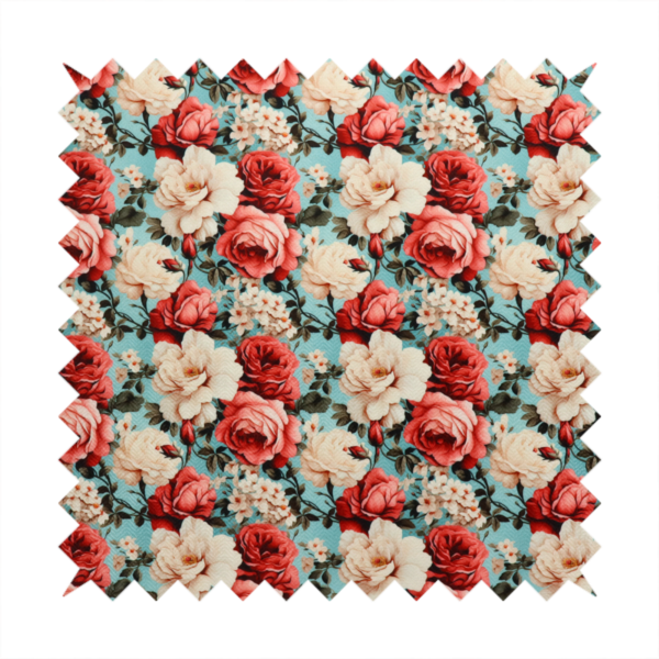 Vintage red, pink, and cream roses print fabric on a duck egg blue background.