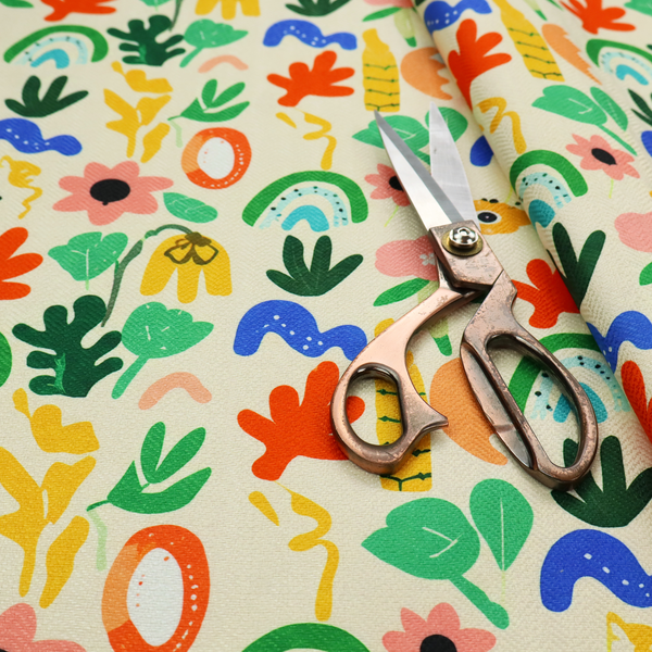 Playful Matisse-style abstract floral and botanical print fabric on an off-white background.