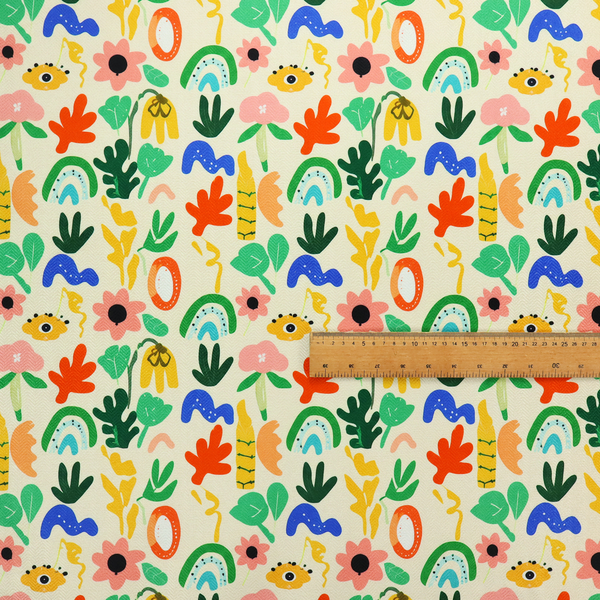 Playful Matisse-style abstract floral and botanical print fabric on an off-white background.