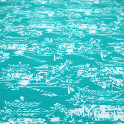 Bright turquoise fabric featuring a white Chinoiserie Toile pattern with pagoda structures, Asian landscape scenes, and botanical details.   