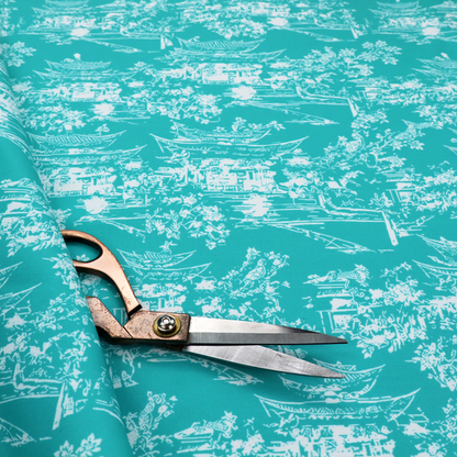 Bright turquoise fabric featuring a white Chinoiserie Toile pattern with pagoda structures, Asian landscape scenes, and botanical details.   