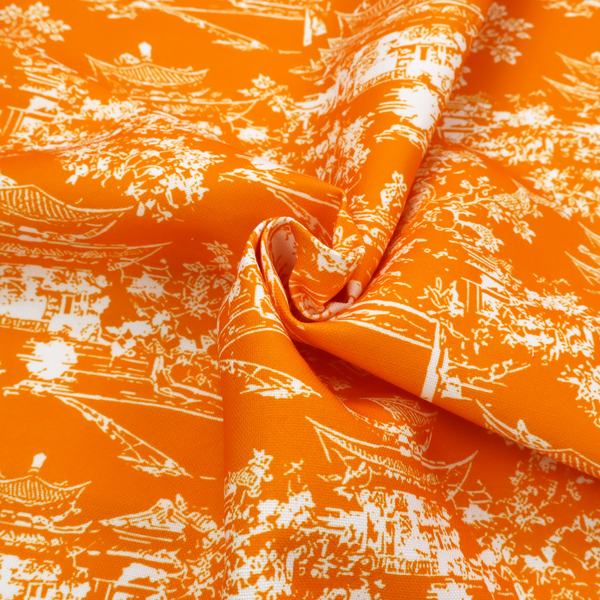 Vibrant orange fabric featuring a white Chinoiserie Toile pattern with pagodas, scenic Asian landscapes, and botanical details.   
