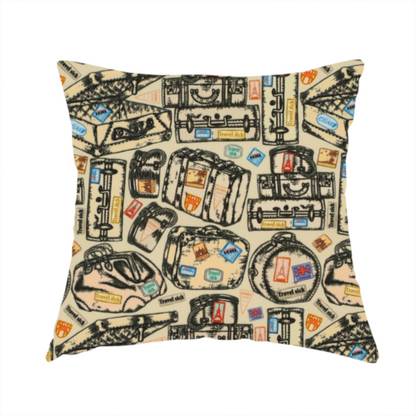 The fabric that has been used to create this cushion includes numerous variations of sketched travel bags, along with colourful stamps from different holiday destinations, on a natural background.