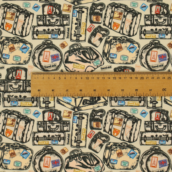 This fabric includes numerous variations of sketched travel bags, along with colourful stamps from different holiday destinations, on a natural background.