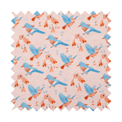 This fabric includes blue and pink birds in various positions on a soft pink background.