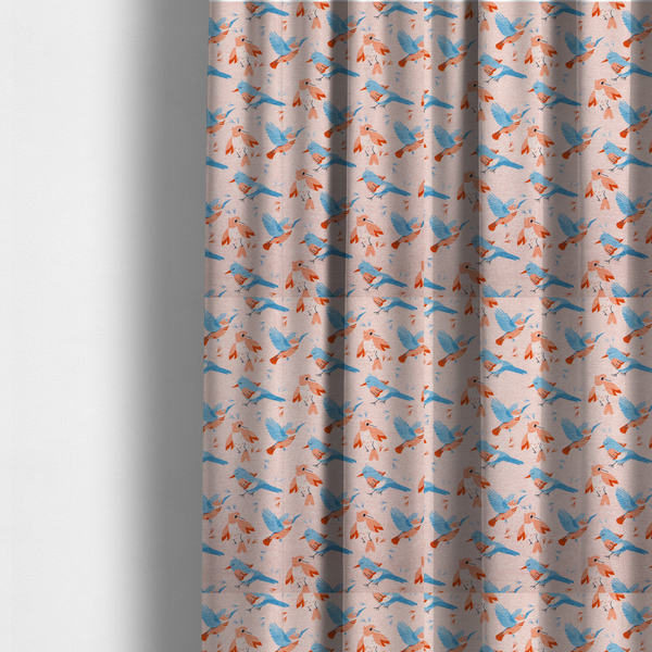 The fabric used to create these made-measure-curtains includes blue and pink birds in various positions on a soft pink background.