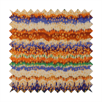 This fabric has a soft chevron pattern, the stripes are made up of blues, greens and oranges, whilst also featuring a leopard pattern.