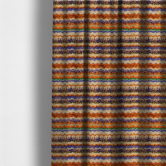 The fabric used to create these made-to-measure curtains has a soft chevron pattern, the stripes are made up of blues, greens and oranges, whilst also featuring a leopard pattern.