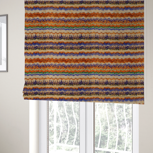 The fabric used to create these Roman blinds has a soft chevron pattern, the stripes are made up of blues, greens and oranges, whilst also featuring a leopard pattern.