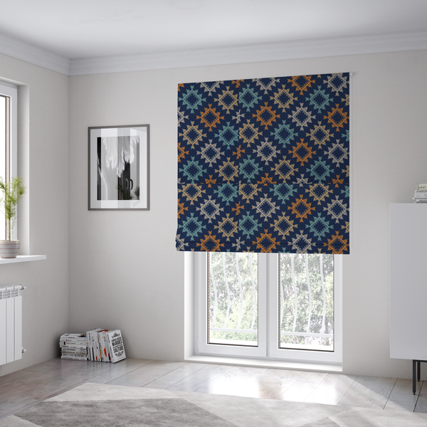 The fabric used to create these Roman blinds, features repeated geometric shapes in blues, oranges and pinks on a navy blue background.