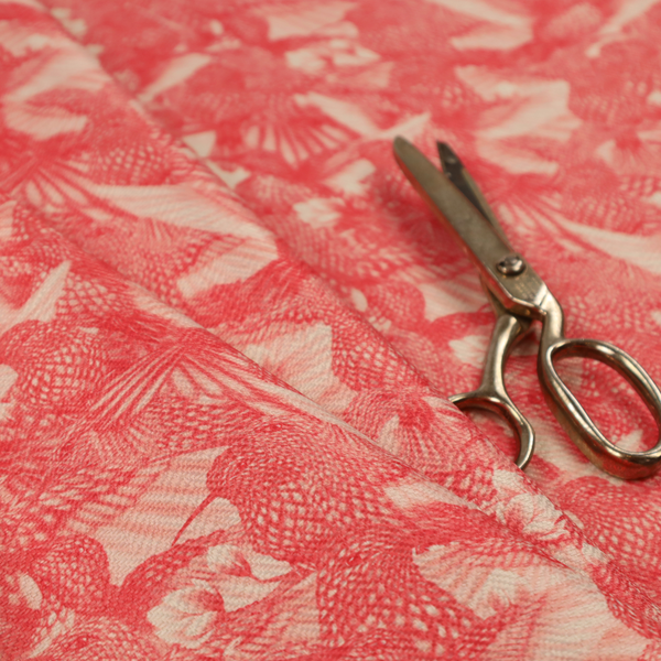 This fabric is saturated with pink illustrative hummingbirds.