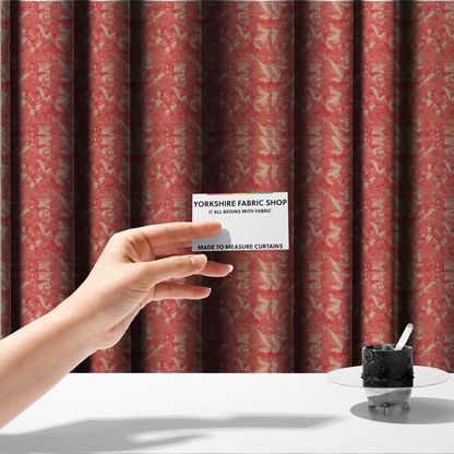 The fabric used to create these made-to-measure curtains, is saturated with pink illustrative hummingbirds.