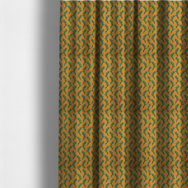 The fabric used for these made-to-measure curtains has a repeated green leaf/floral design on a warm yellow/golden background.