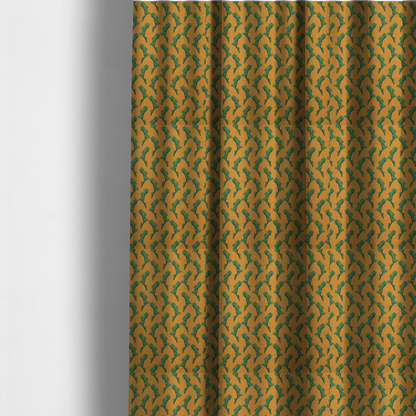 The fabric used for these made-to-measure curtains has a repeated green leaf/floral design on a warm yellow/golden background.