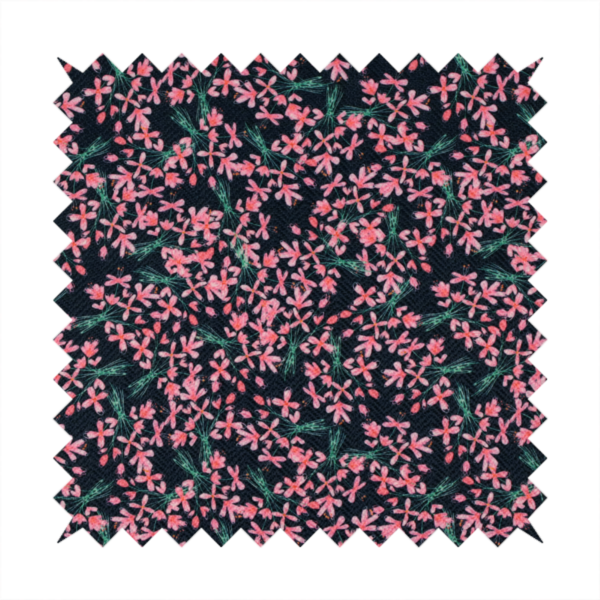 This fabric is saturated with pink floral bouquets on a deep green background.