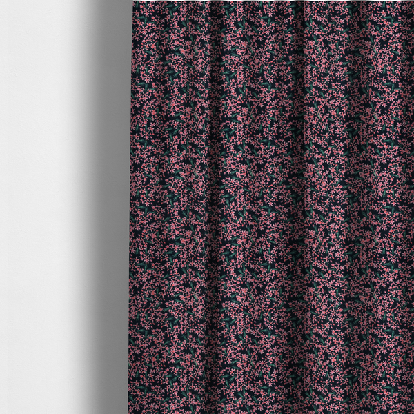 The fabric used to create these made-to-measure curtains is saturated with pink floral bouquets on a deep green background.
