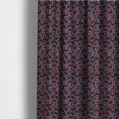 The fabric used to create these made-to-measure curtains is saturated with pink floral bouquets on a deep green background.