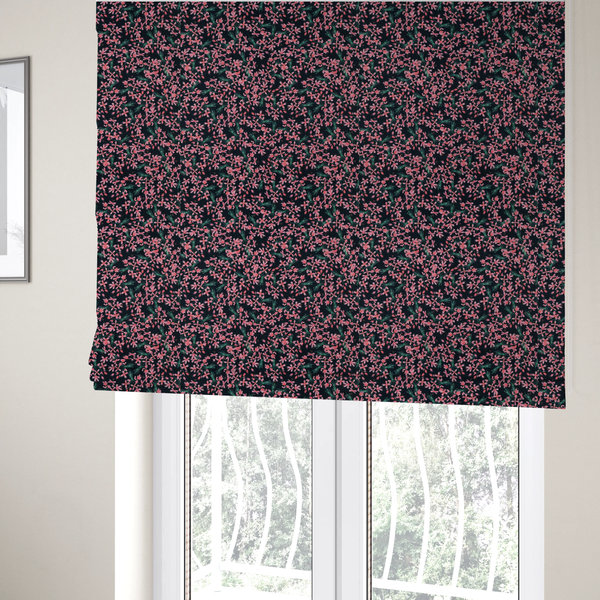 The fabric used to create these Roman blinds is saturated with pink floral bouquets on a deep green background.