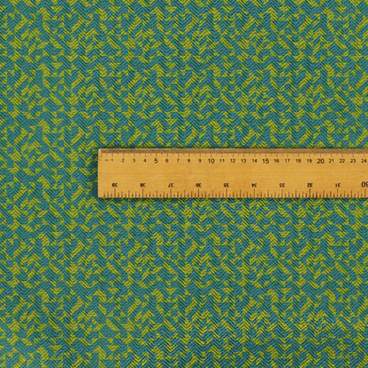 This fabric has a small, repeated geometric pattern in lime green and blue.
